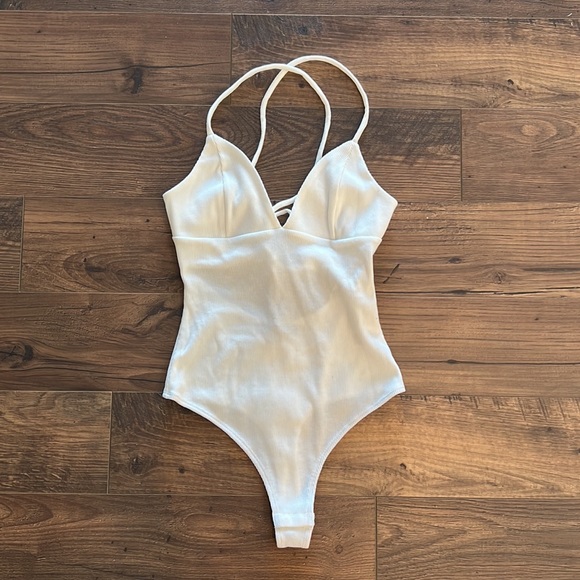 Lulus Tops - Chic Spin White Sleeveless Lace-Up Backless Bodysuit
